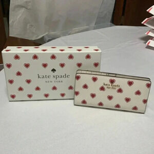 KATE SPADE ♠️ Slim Bifold Wallet,NWT. Comes with/box ❤️❤️❤️